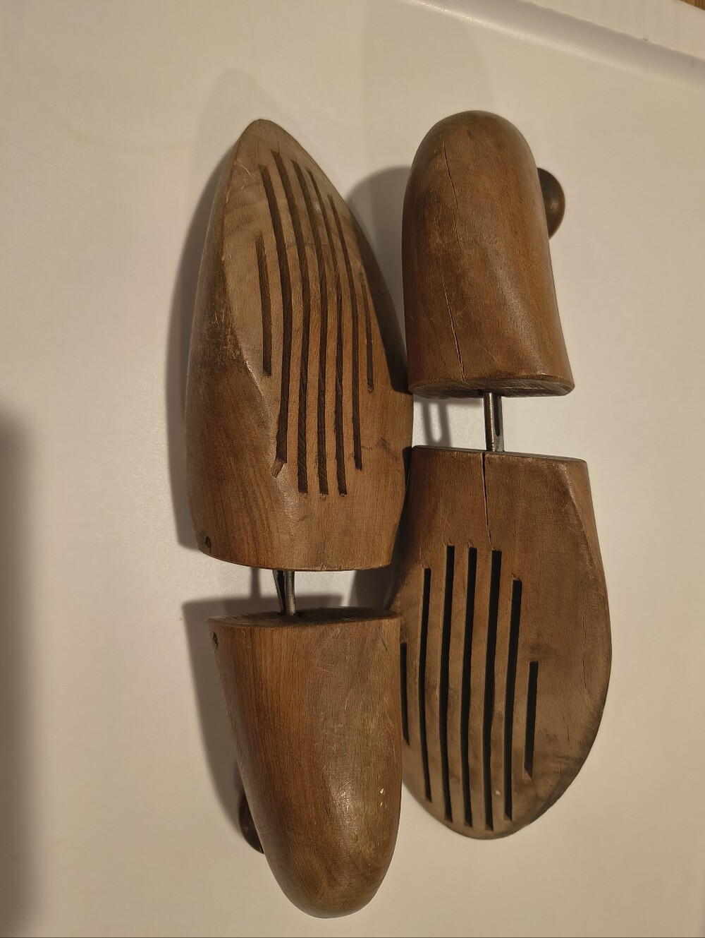 antique wooden shoe trees marked 8 4 with an F emblem